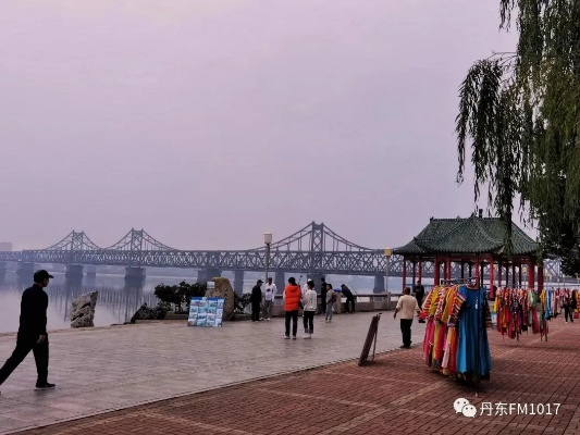 丹东市天气预报，明日细雨润江城，气温略降需添衣